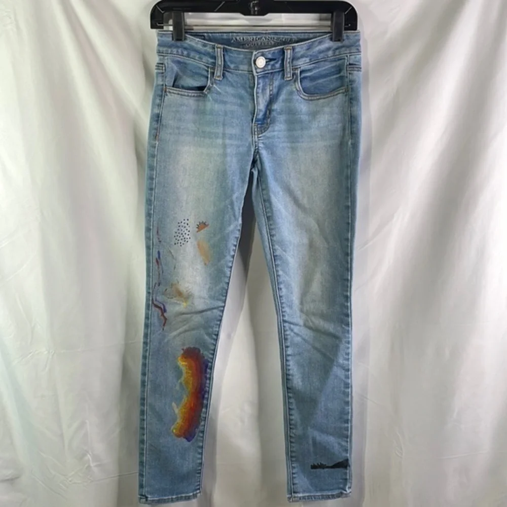 American Eagle super stretch skinny jeans with handpainted artwork
